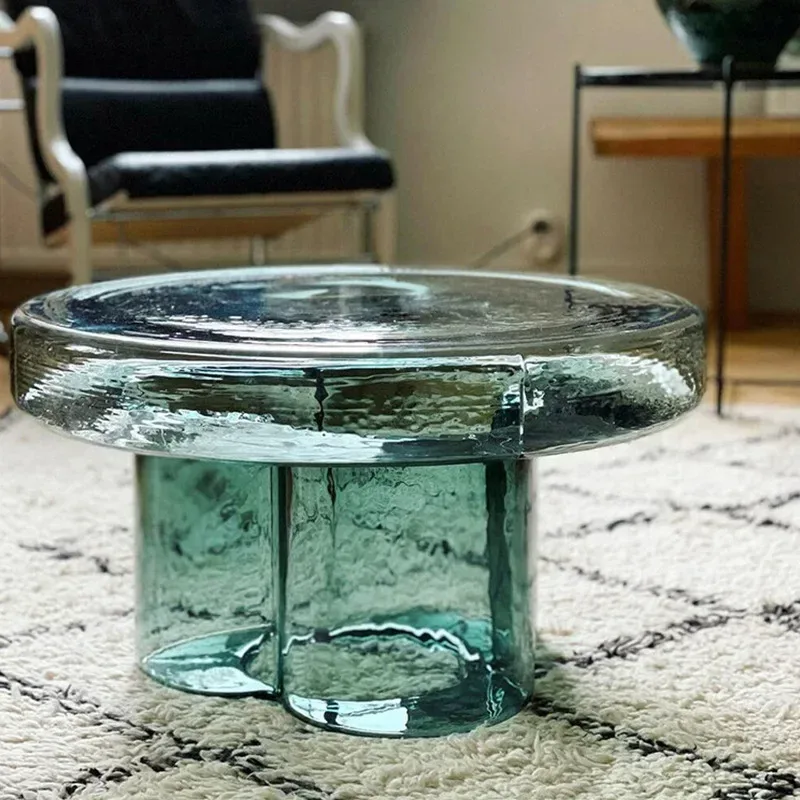 a glass table on a rug